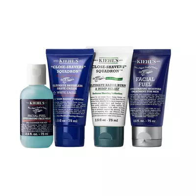 Kiehl’s holiday men’s travel-size gift set with face wash, shave cream, scrub, and moisturizer; promotional elements highlight “Travel Sizes” and a $XX value.